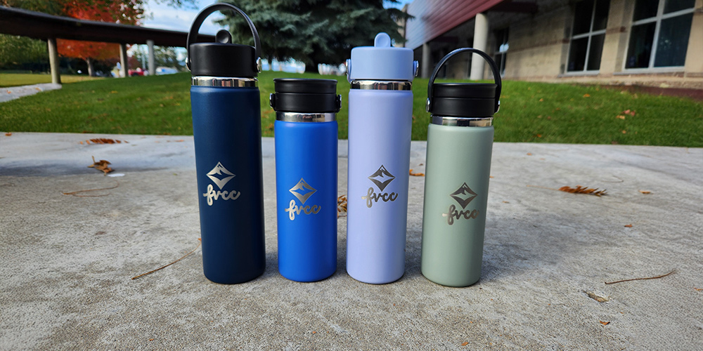 FVCC Hydroflasks in blue, teal, light blue and sage